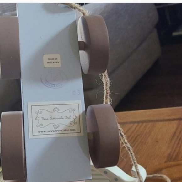 Blue dotted dinosaur wooden pull toy - Picture 4 of 4